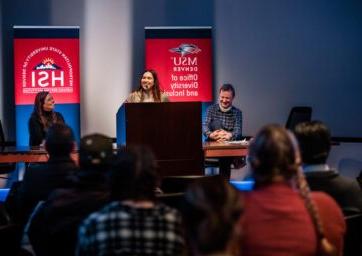 Two panelists and a speaker at the MSU Denver Office of Diversity and Inclusion DACA summit